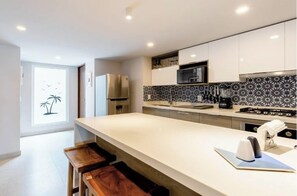 Deluxe Apartment, Pool View | Private kitchen | Fridge, stovetop, toaster, blender