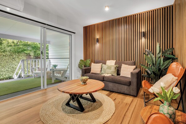 Deluxe appartement, uitzicht op rivier | Woonruimte