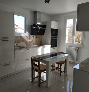 Coffee/tea maker, fridge, microwave, oven