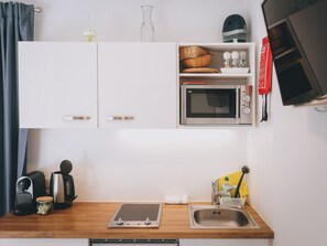 Fridge, microwave, coffee/tea maker, electric kettle