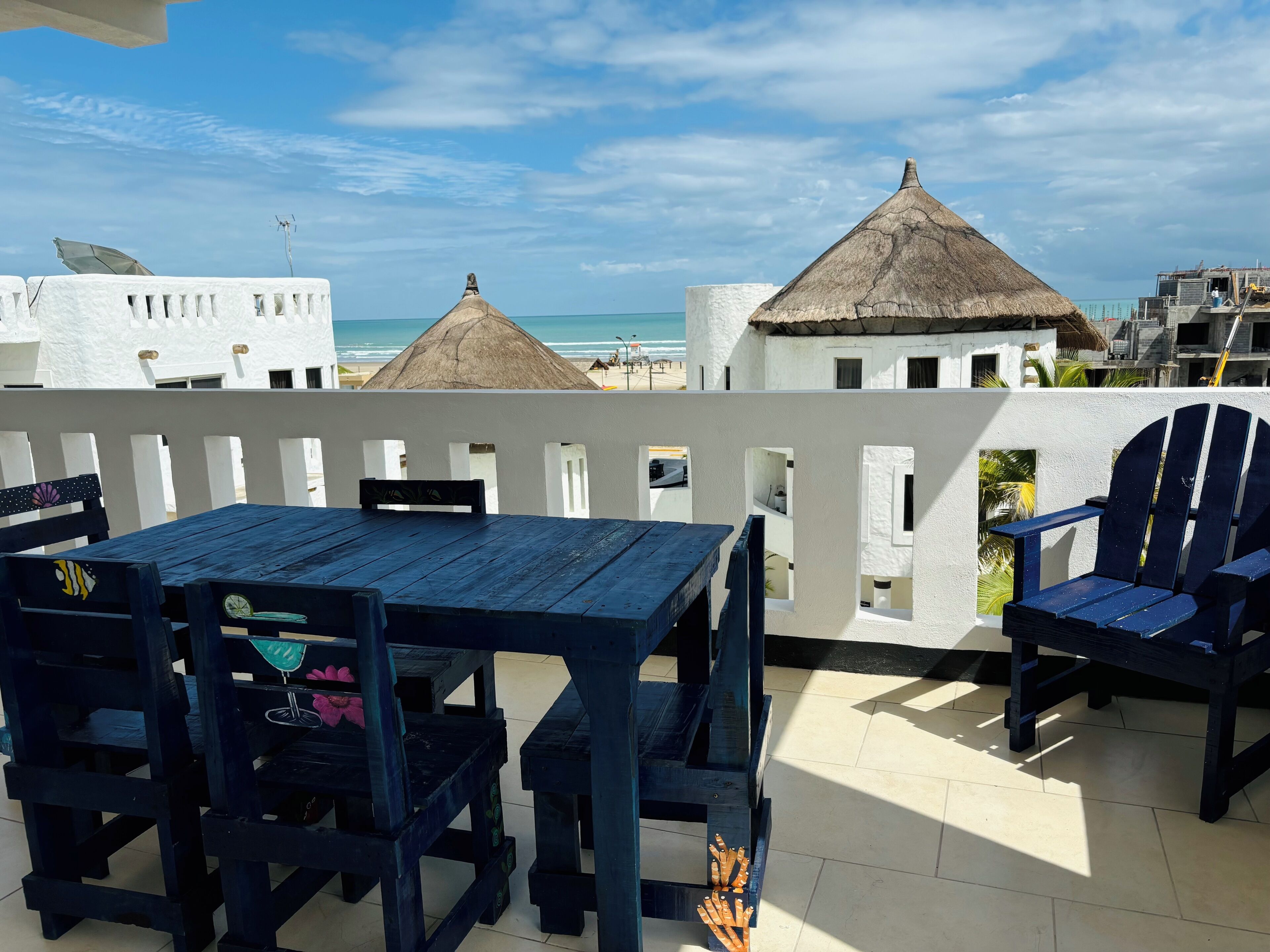 Triple Room, Partial Sea View | Living area | 32-inch flat-screen TV with digital channels