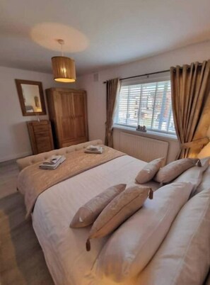2 bedrooms, travel crib, WiFi, bed sheets