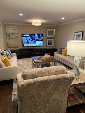 Smart TV, fireplace, books