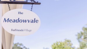 A sign with the text 'The Meadowvale ForFriends Village'.