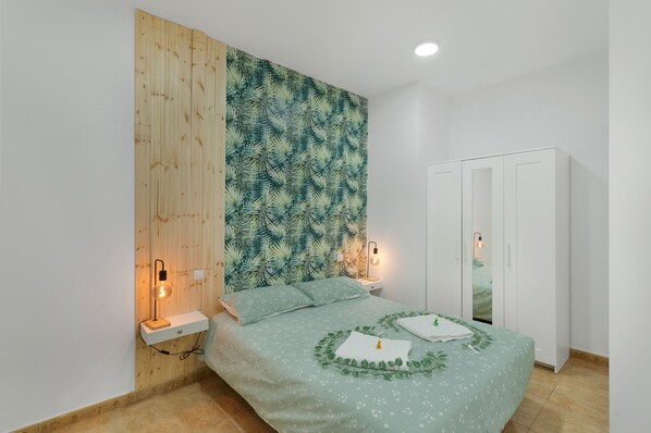 2 slaapkamers, een strijkplank/strijkijzer, gratis wifi, beddengoed