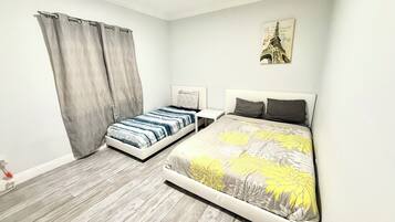 2 dormitorios, tabla de planchar con plancha, wifi gratis y ropa de cama