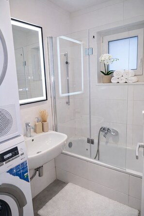 Hair dryer, towels, toilet paper