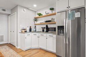 Fridge, microwave, coffee/tea maker, toaster