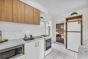 Fridge, microwave - Superior - 3 Bed ground floor Apt (Merimbula)