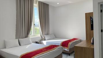 Basic-dobbeltværelse - udsigt til have | Skrivebord, arbejdsområde til bærbare computere, gratis Wi-Fi, sengetøj