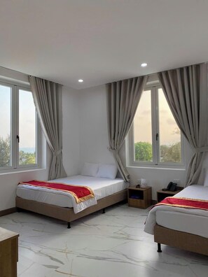 Basic Double Room, Beach View | Desk, laptop workspace, free WiFi, bed sheets