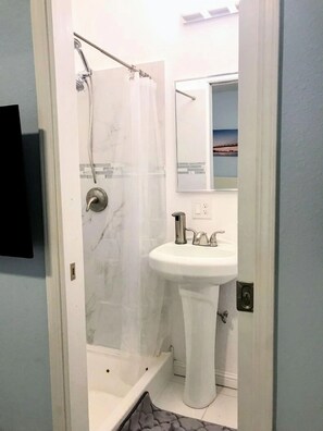 Hair dryer, towels, soap, toilet paper