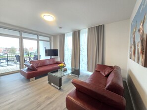 TV, stereo - Ferienwohnung NorderHafen - Welcome to the modern vacation apartment (Norden)