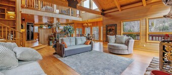Majestic Riverfront Chalet is set down a serene and private drive.