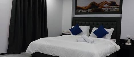 Elite Double Room, City View | In-room safe, laptop workspace, blackout drapes, iron/ironing board