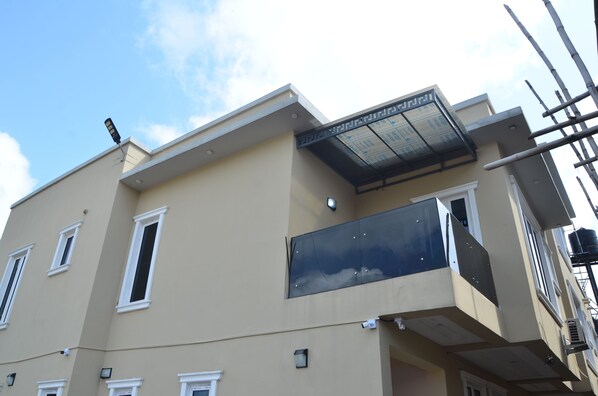 Exterior detail - A cozy home apartment that serves as home away from home. (Asaba)