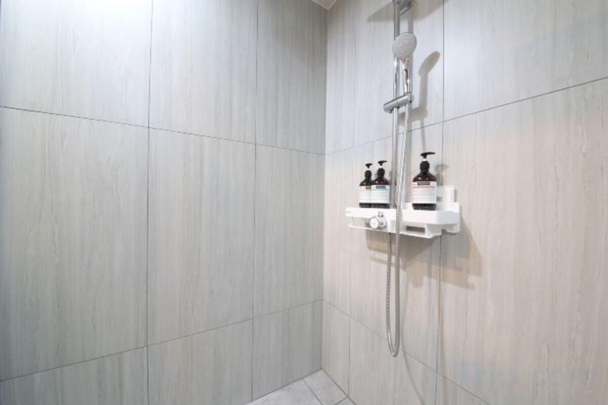 Bathroom | Hair dryer, slippers, towels, soap