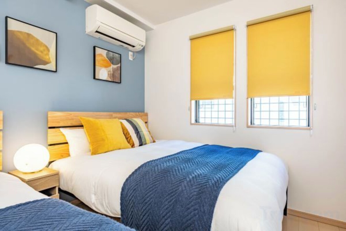 2 bedrooms, premium bedding, blackout drapes, iron/ironing board