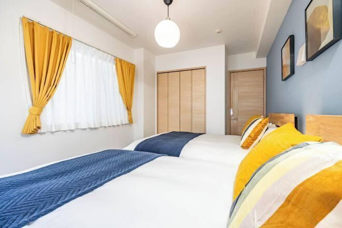 2 bedrooms, premium bedding, blackout drapes, iron/ironing board