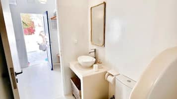 Hair dryer, towels, soap, shampoo