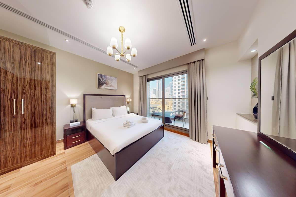 Apartment, 1 Bedroom, Pool Access | 5 bedrooms, iron/ironing board, free WiFi, bed sheets