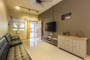 Deluxe House, 3 Bedrooms | Living area - Kimsar 3BR Family Inn by uBook (Perai)