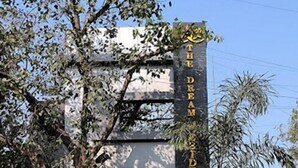 A building with signage for 'The Dream Residency'. - Glitz Hotels DR Residency (Mumbai)