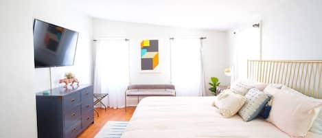 1 bedroom, desk, iron/ironing board, travel crib