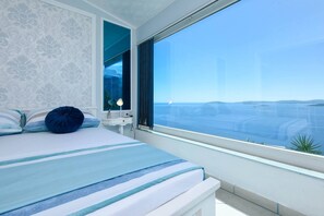 2 عدّة غرف نوم ومكواة/لوح كي وواي فاي وملاءات أسرّة