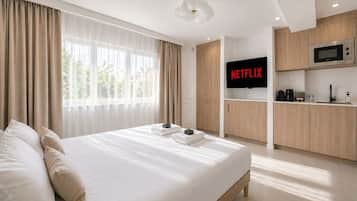 Suite Royal, dapur, pemandangan kebun | Seprai katun Mesir, seprai premium, dan tempat tidur Select Comfort