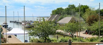 Double room with balcony and Bodden view directly at the harbor of Wustrow