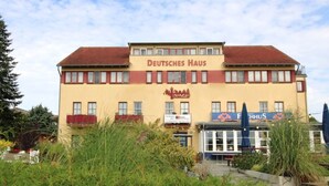A building with a sign reading "Deutsches Haus".