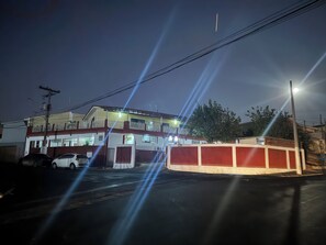 Front of property - evening/night - Pousada B&B (Capivari)