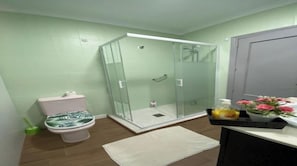 Shower, hair dryer, towels, soap