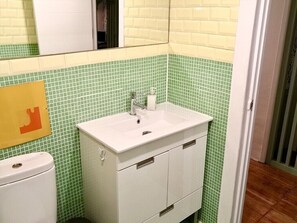 Shower, towels, toilet paper