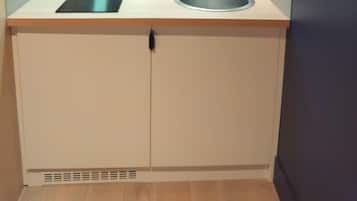 Mini-fridge, microwave, stovetop, cookware/dishes/utensils