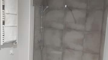Shower, towels, soap, shampoo
