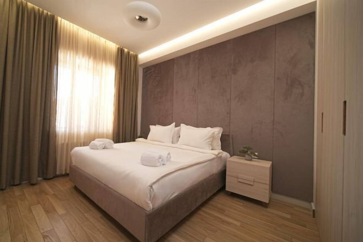 Premium bedding, blackout drapes, soundproofing, iron/ironing board
