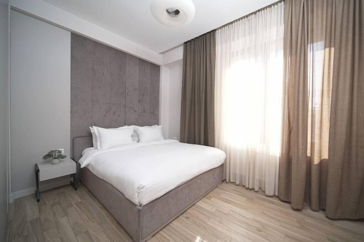 Premium bedding, blackout drapes, soundproofing, iron/ironing board