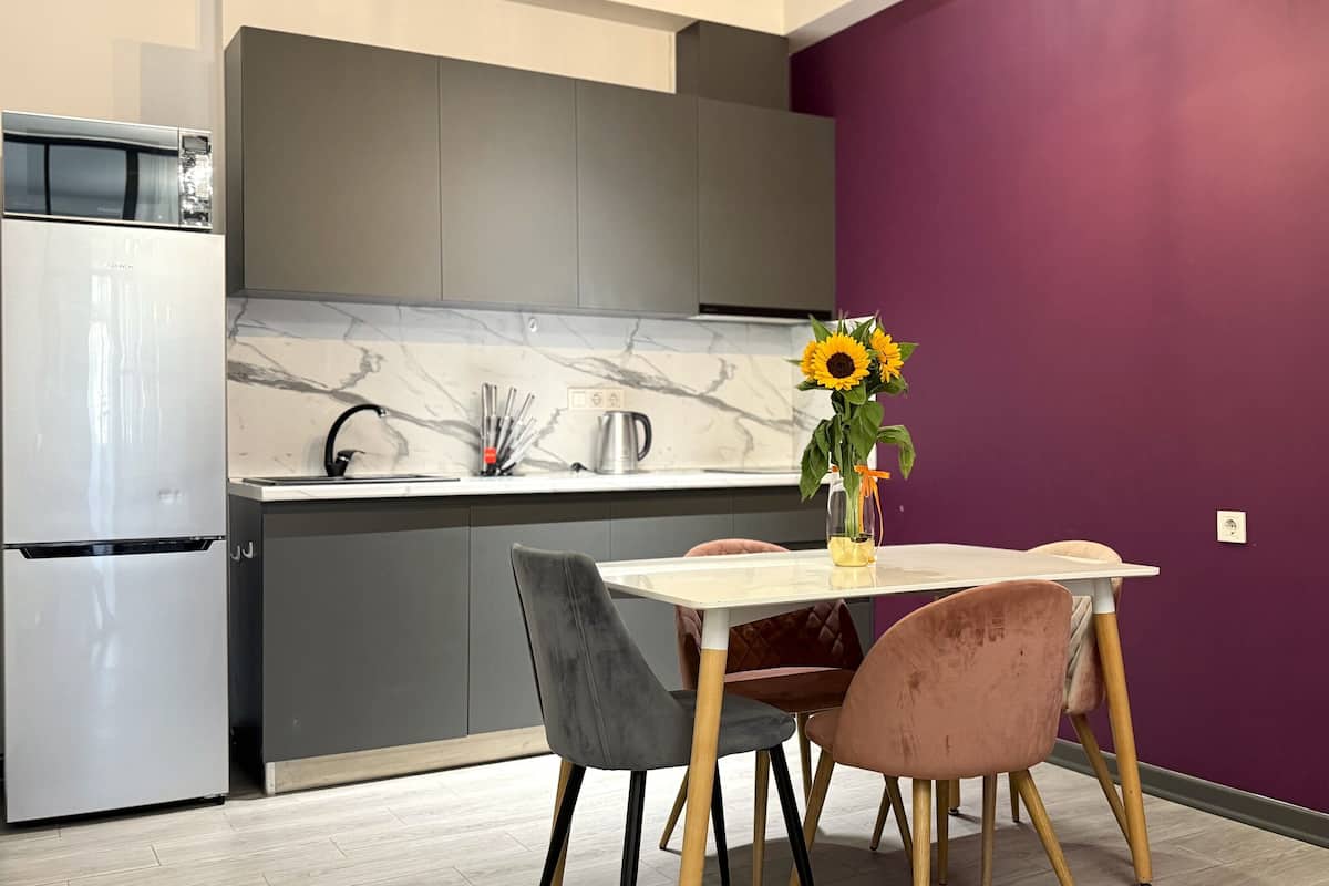 Design Apartment, 2 Bedrooms, Balcony, Courtyard View | Private kitchen | Fridge, microwave, stovetop, electric kettle