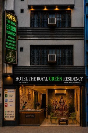 The exterior of Hotel The Royal Green Residency with a reception area visible. - The Royal Green Residency (Varanasi)