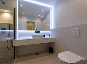 A modern bathroom with a white sink, mirror, and toilet. - Moonlit Mirage Villa With Pool, Gym and Sauna (Kastela)