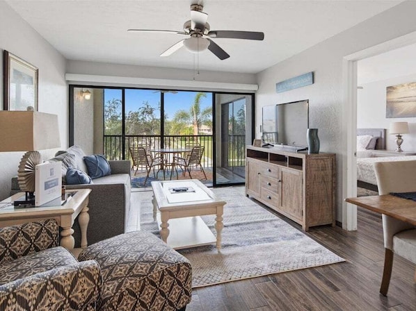 TV - Waterfront 1BR condo in Marco Island with pool, marina, WiFi. (Marco Island)