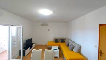 Apartment (Two Bedroom Apartment with Terrace) | Living room | 32-inch flat-screen TV with cable channels