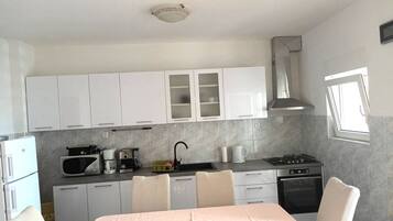 Apartment (Two Bedroom Apartment with Terrace) | Private kitchen | Fridge