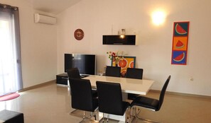 Apartment (Three Bedroom Apartment) | Living room | 32-inch flat-screen TV with cable channels - Expansive Ciovo Apartment With Sea-views, Balcony and Outdoor Dining (Okrug)