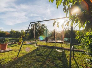 Ferienhaus (Three Bedroom Holiday Home with Pool) | Außen-Kinderspielplatz