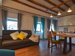 Apartment (One Bedroom Apartment) | Living room | 32-inch flat-screen TV with satellite channels - Elegant Rovinj Old Town Apartment (Rovinj)