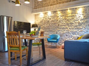 Apartment (One Bedroom Apartment) | Living room | 32-inch flat-screen TV with satellite channels - Elegant Rovinj Old Town Apartment (Rovinj)