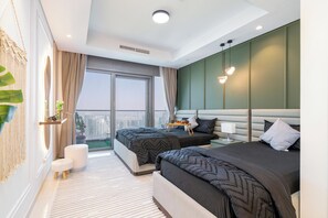 2 chambres, coffres-forts dans les chambres, fer et planche Ă repasser